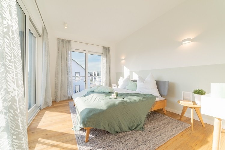Haus mit 2 Wohnungen - mit Grundstücksanteil nur 385.000 € je Familie