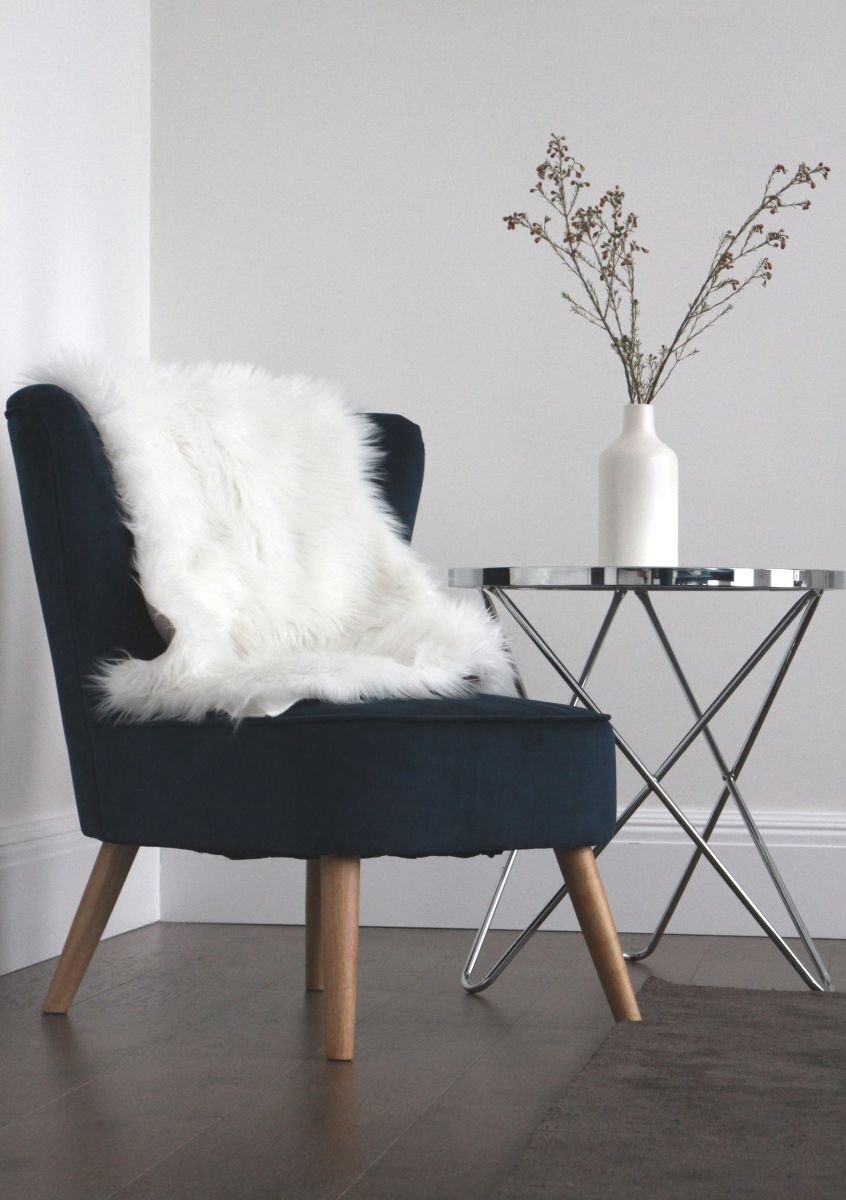 Vom Wohnbereich führt der Weg hinaus auf die überdachte Terrasse.