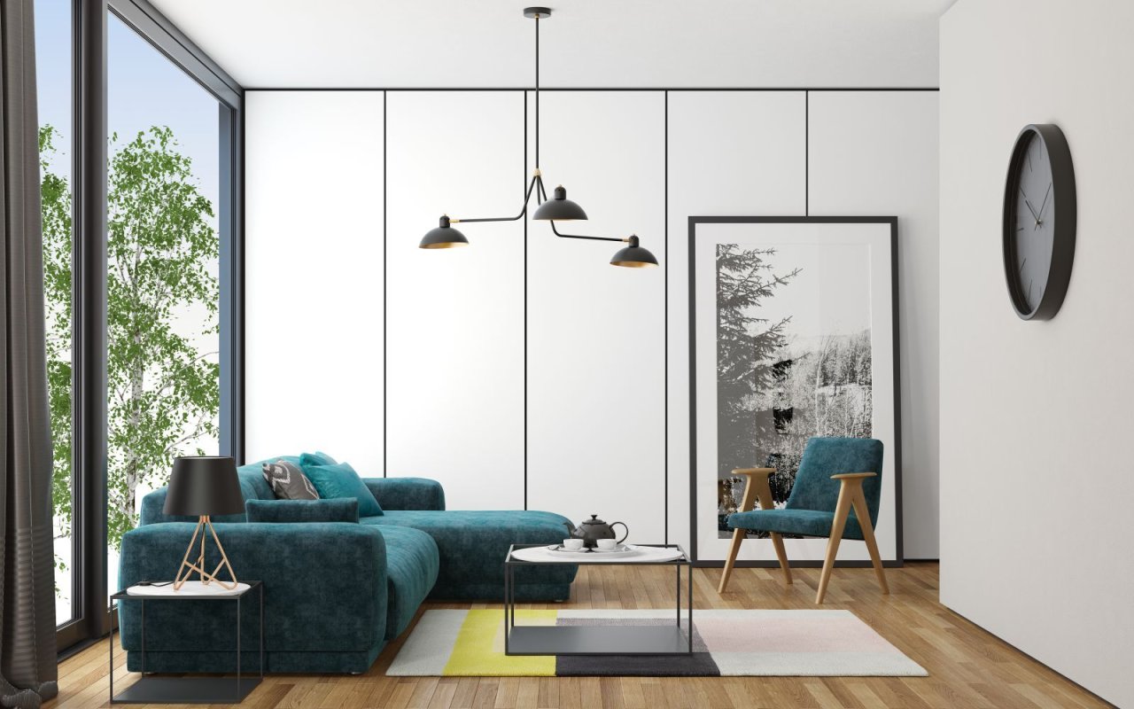 Wohnzimmer mit türkisfarbenem Sofa und Designleuchte