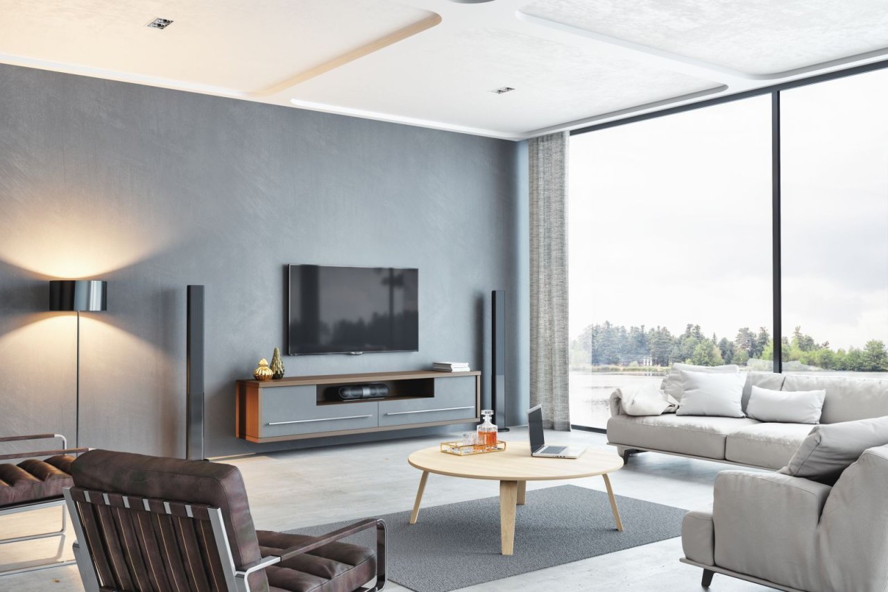 Wohnbereich mit Sofa und TV-Wand