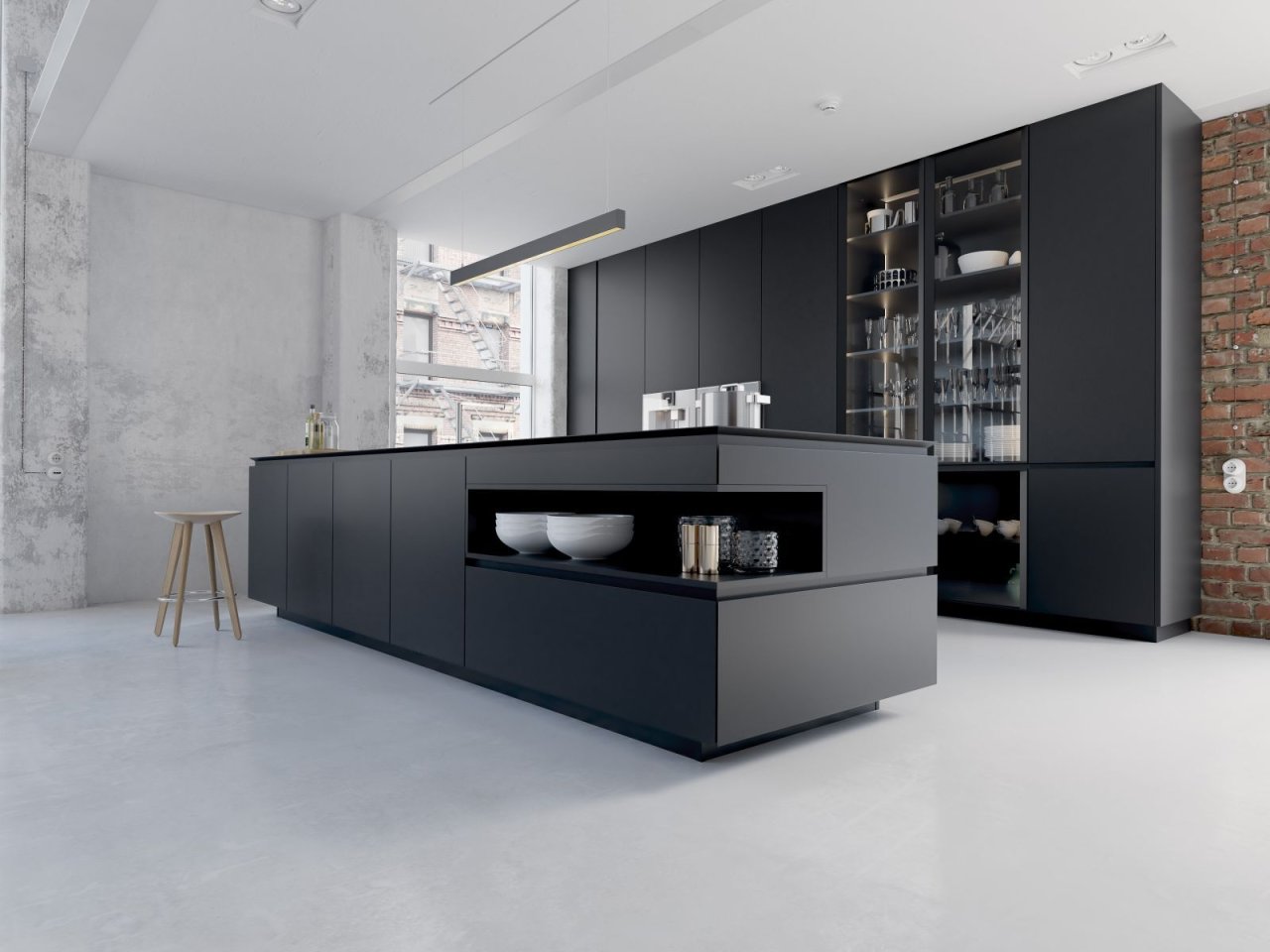 Küche mit Kochinsel und Hochschrankzeile im Raum