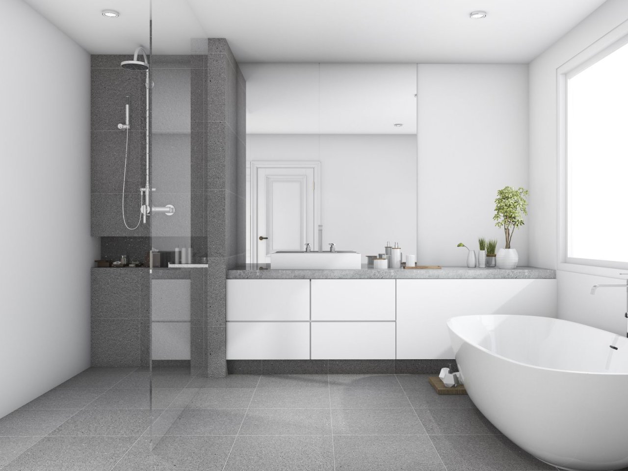 Helles Badezimmer mit Dusche, Waschplatz und freistehender Badewanne